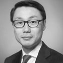 Black and white portrait of Jae Lee